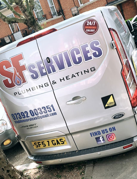 Plumber with customer in the bathroom