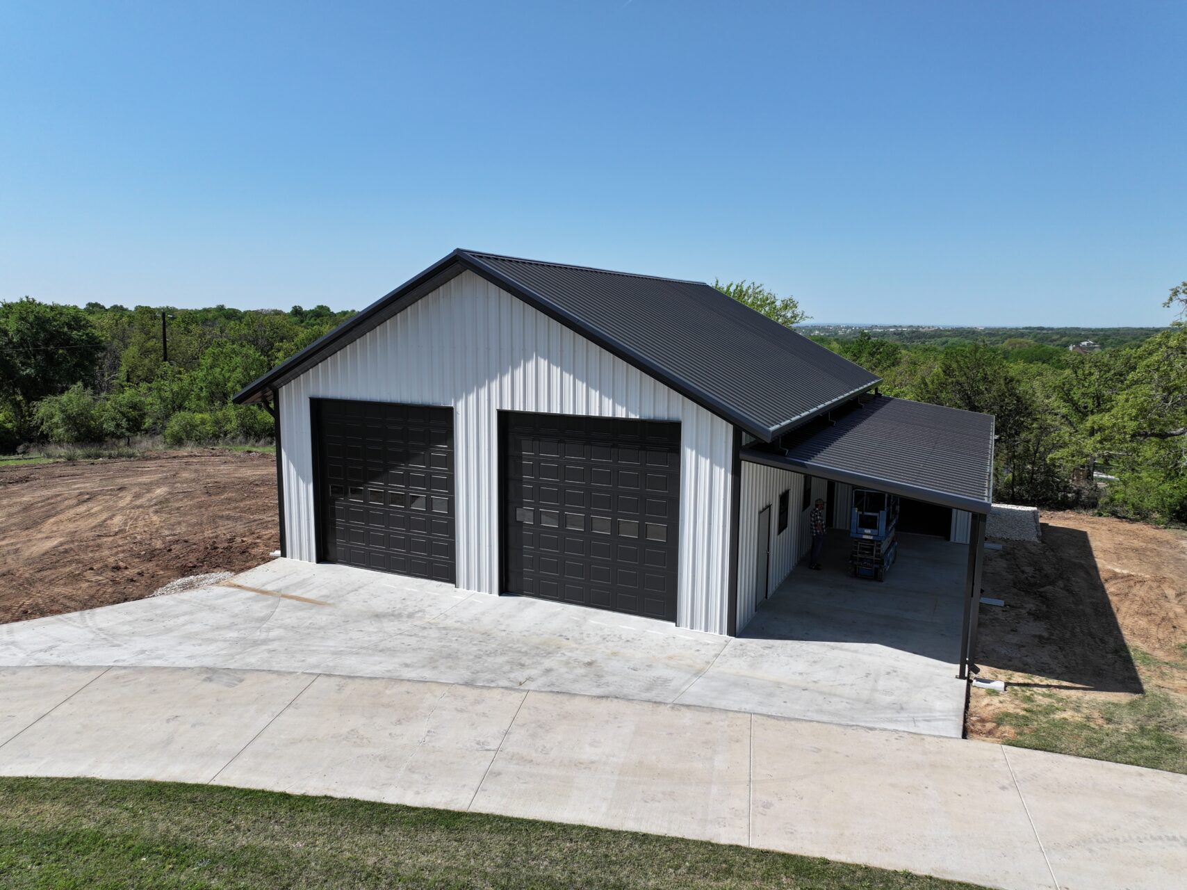 Modern agricultural metal barn by Abilene Metal Building