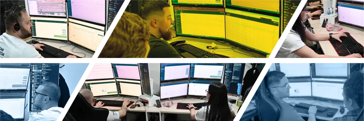 truck dispatch training students working on multiple monitors managing freight loads in real-time