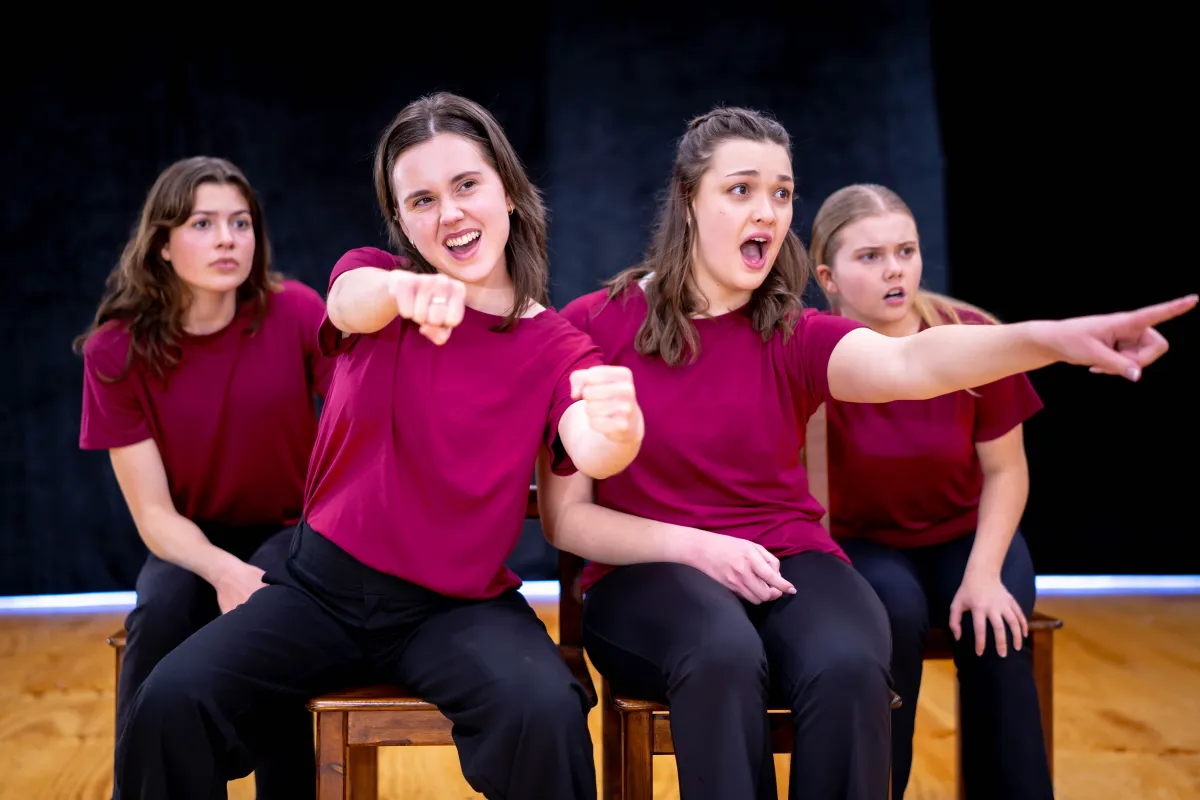 Four women in an acting exercise portraying a lively car scene, full of gestures and expressions, in the Set The Scene’s acting program.