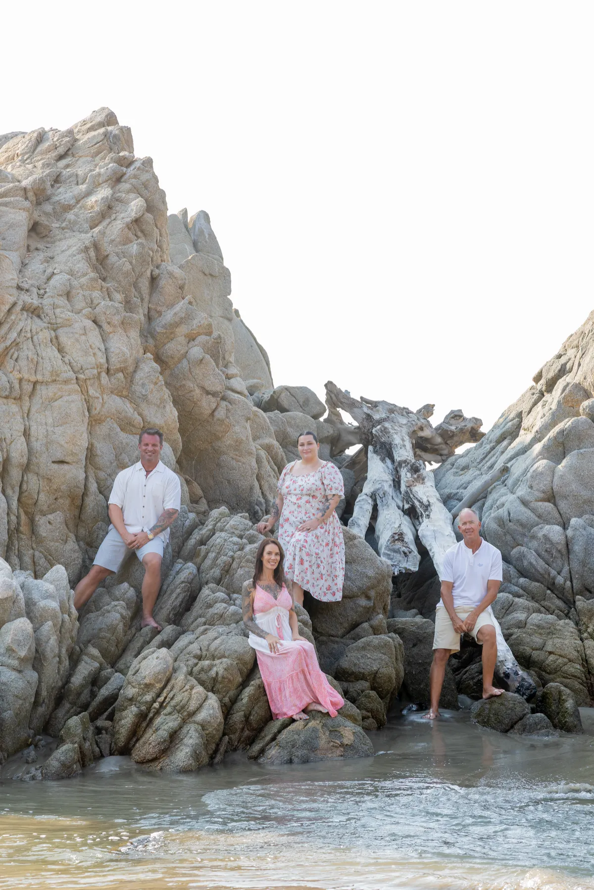 Vistas Realty Group founding family and advisory team in a sunlit Oaxaca courtyard setting