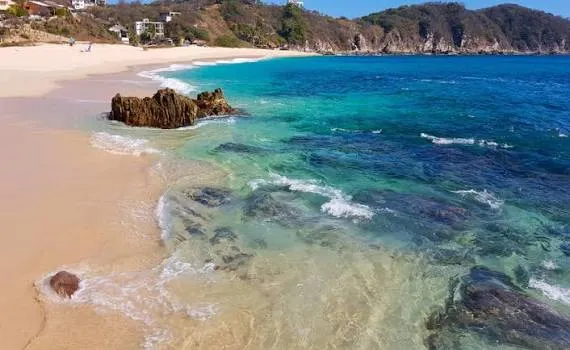 Salchi pristine secluded bay and luxury villa estates at sunset