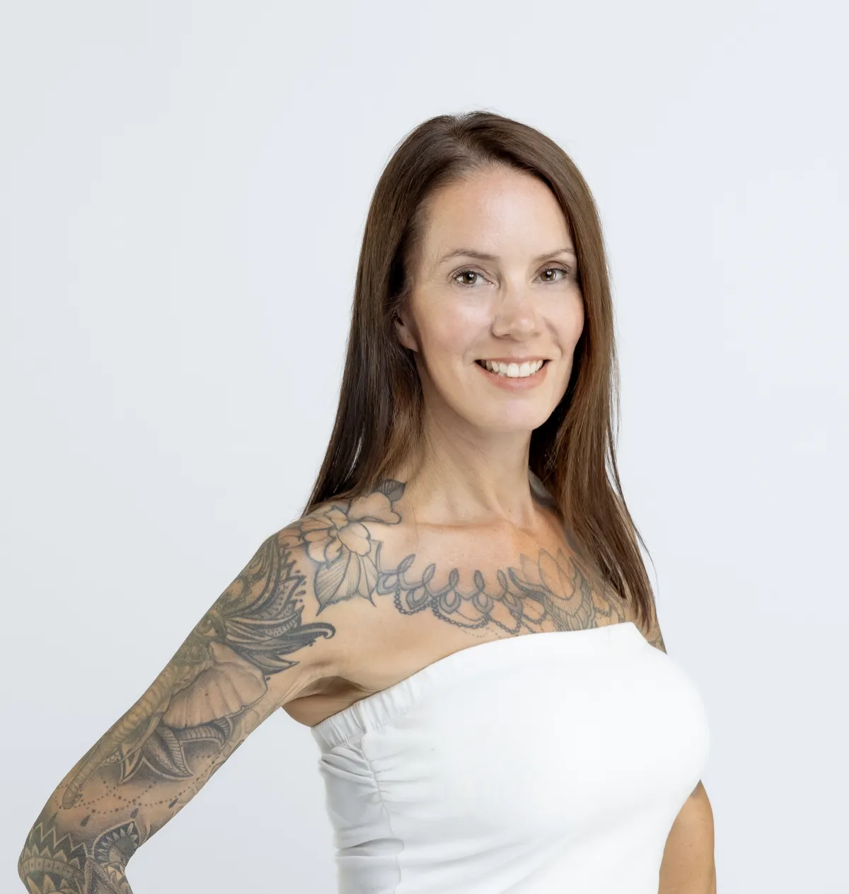 Tracey Greenman portrait, Broker and Owner of Vistas Realty Group in natural coastal light