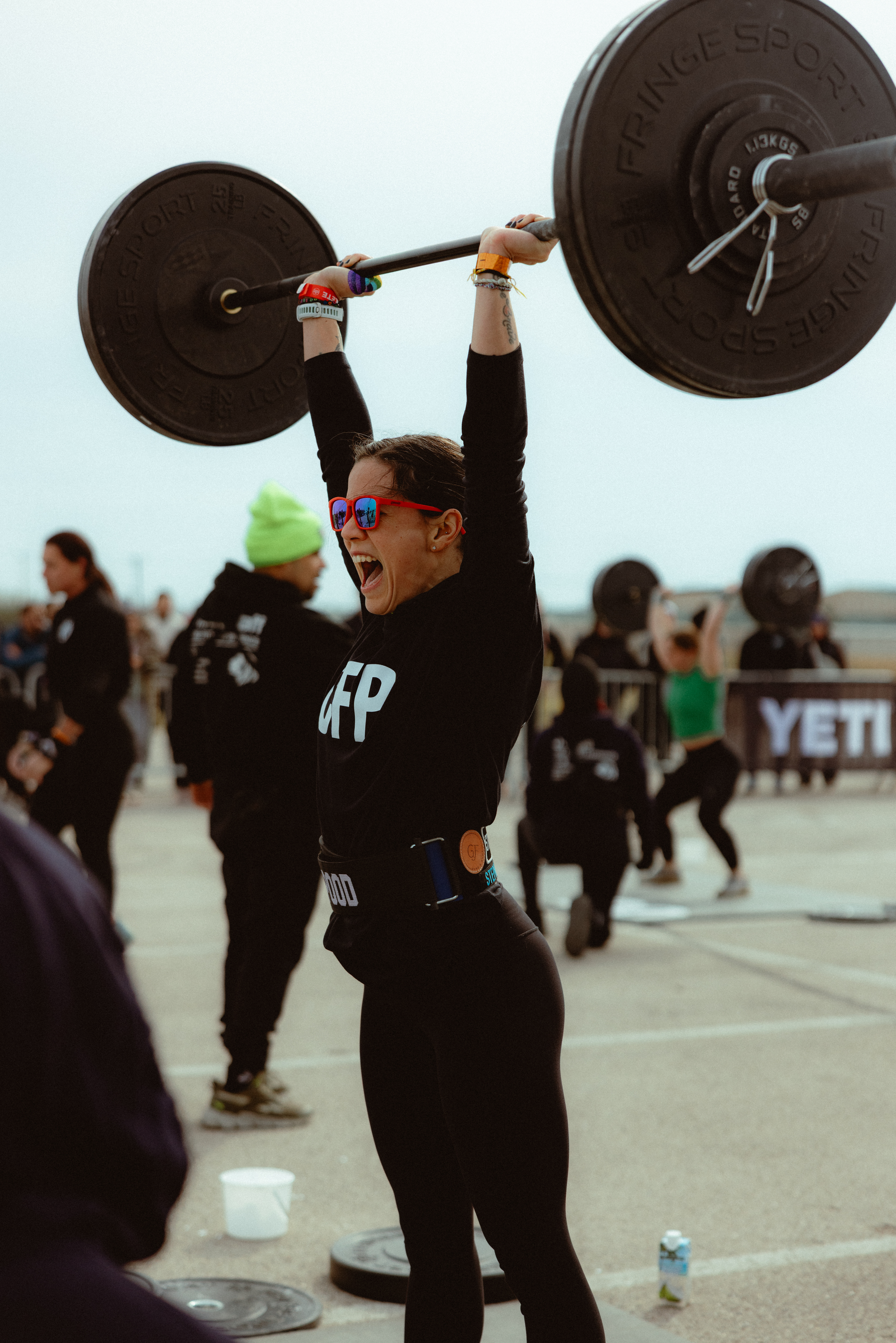Coach Maya leading a strength training session