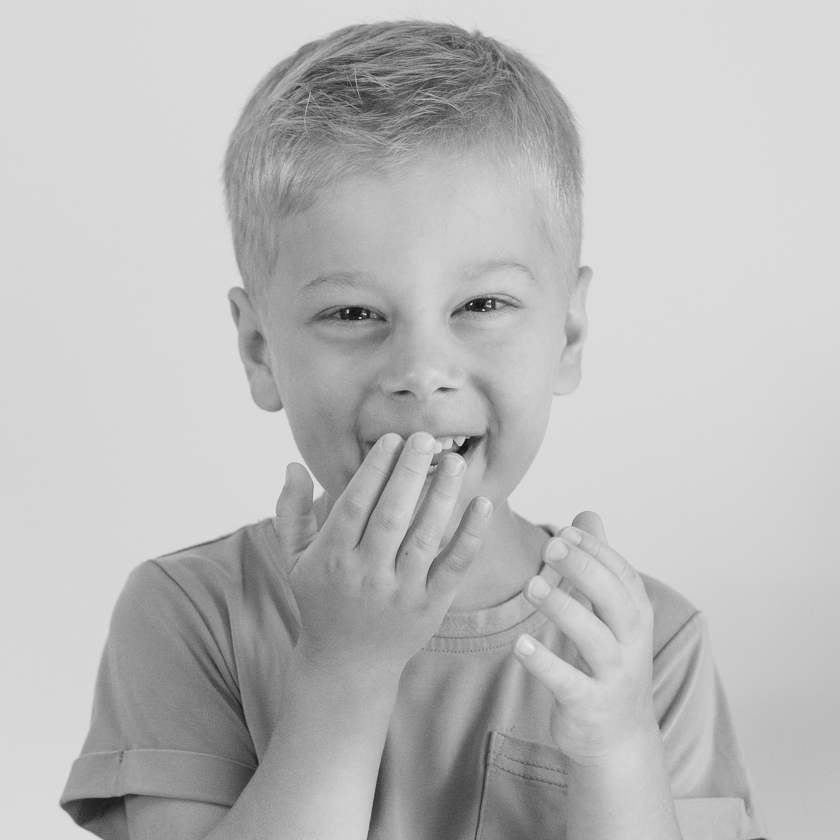 A market vendor is displaying fruits and vegetables.