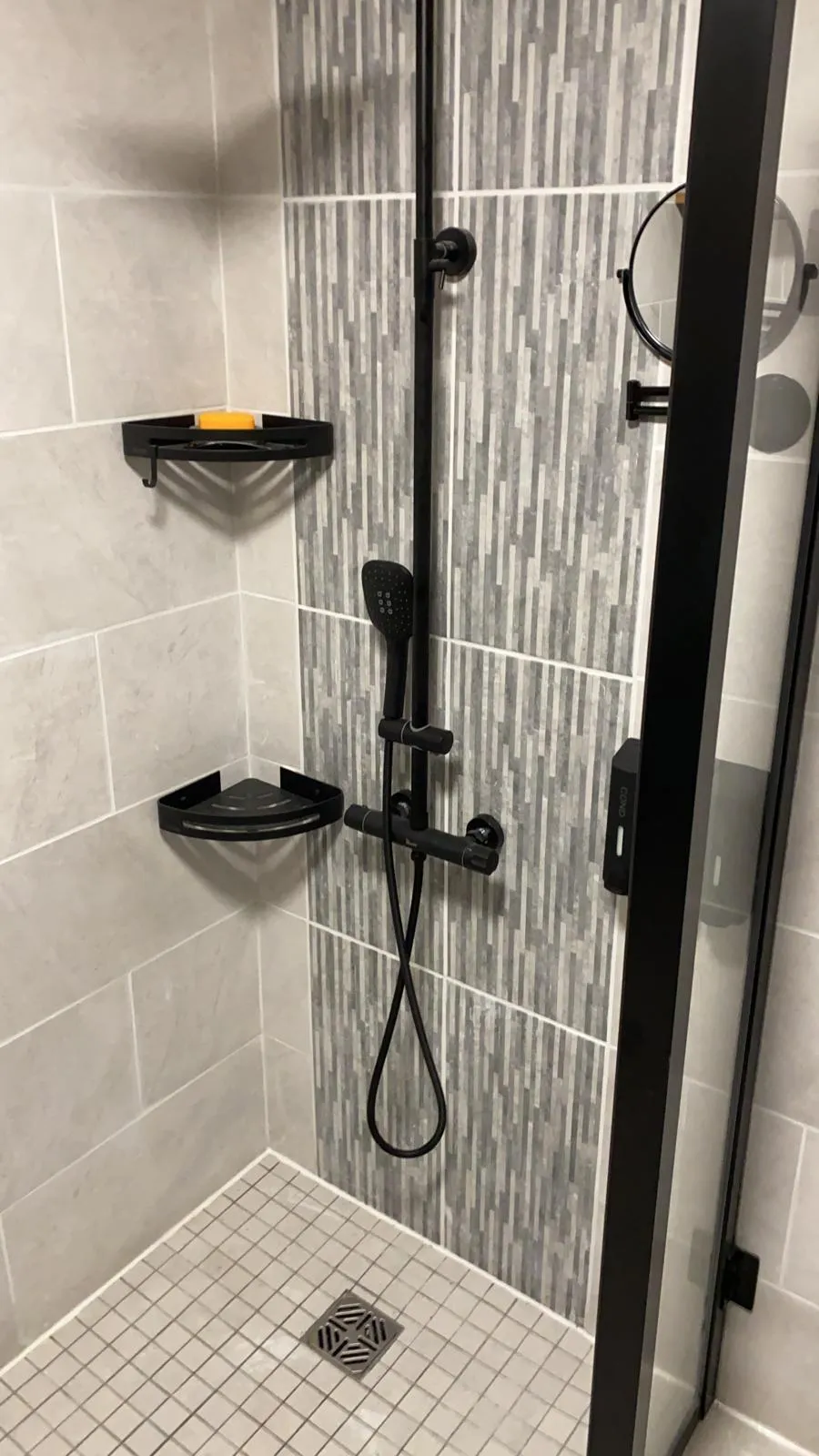 red towel on stainless steel towel rack