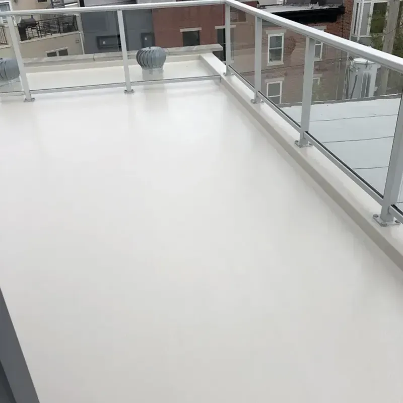 Fiberglass roof installation on a residential balcony, durable and sleek roofing solution.