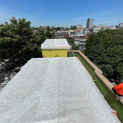 Fiberglass membrane application on roof deck and HVAC pipe, Alpha & Omega Fiberglass repair.