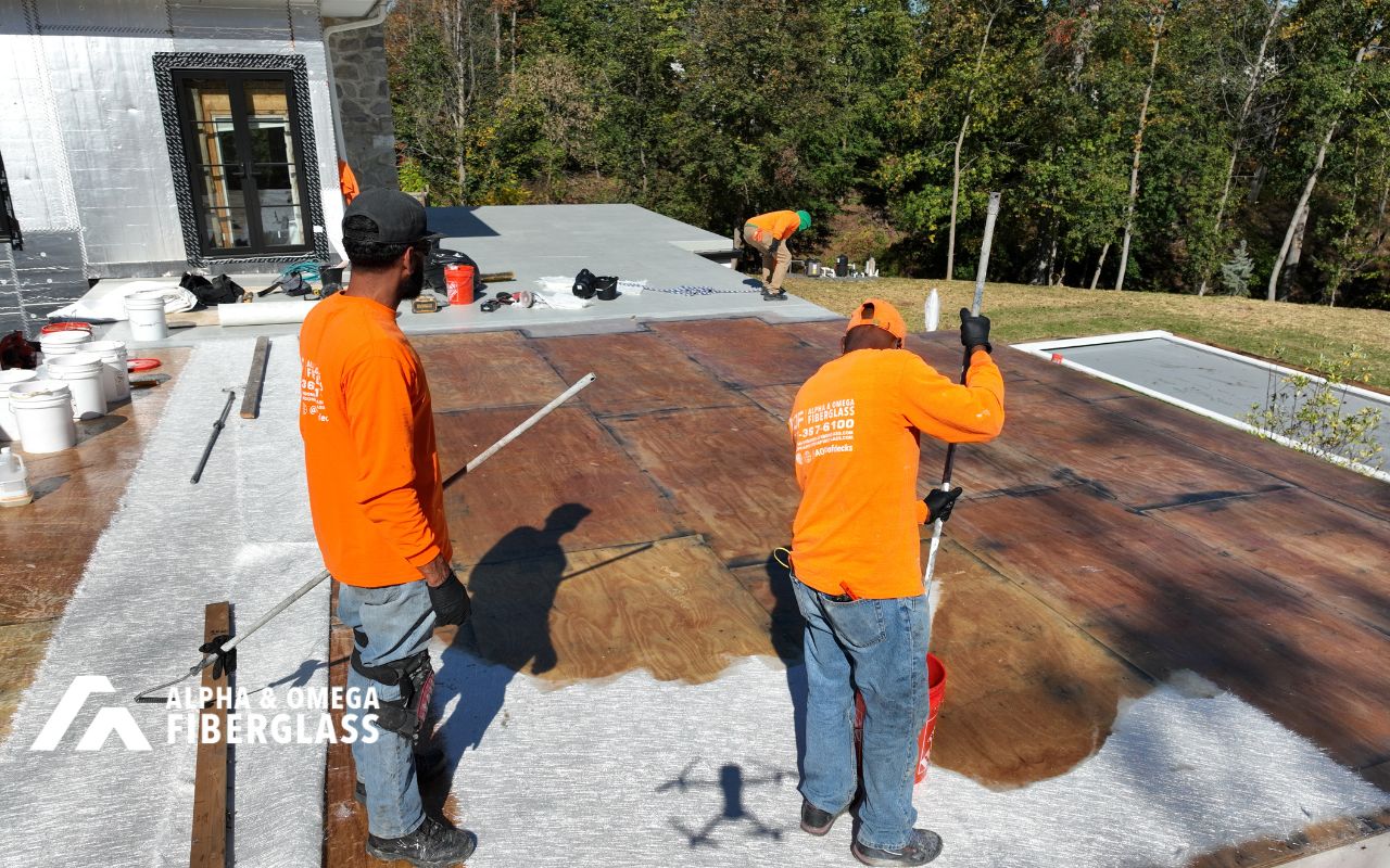 technician checking fiberglass roof expansion joint details before repair
