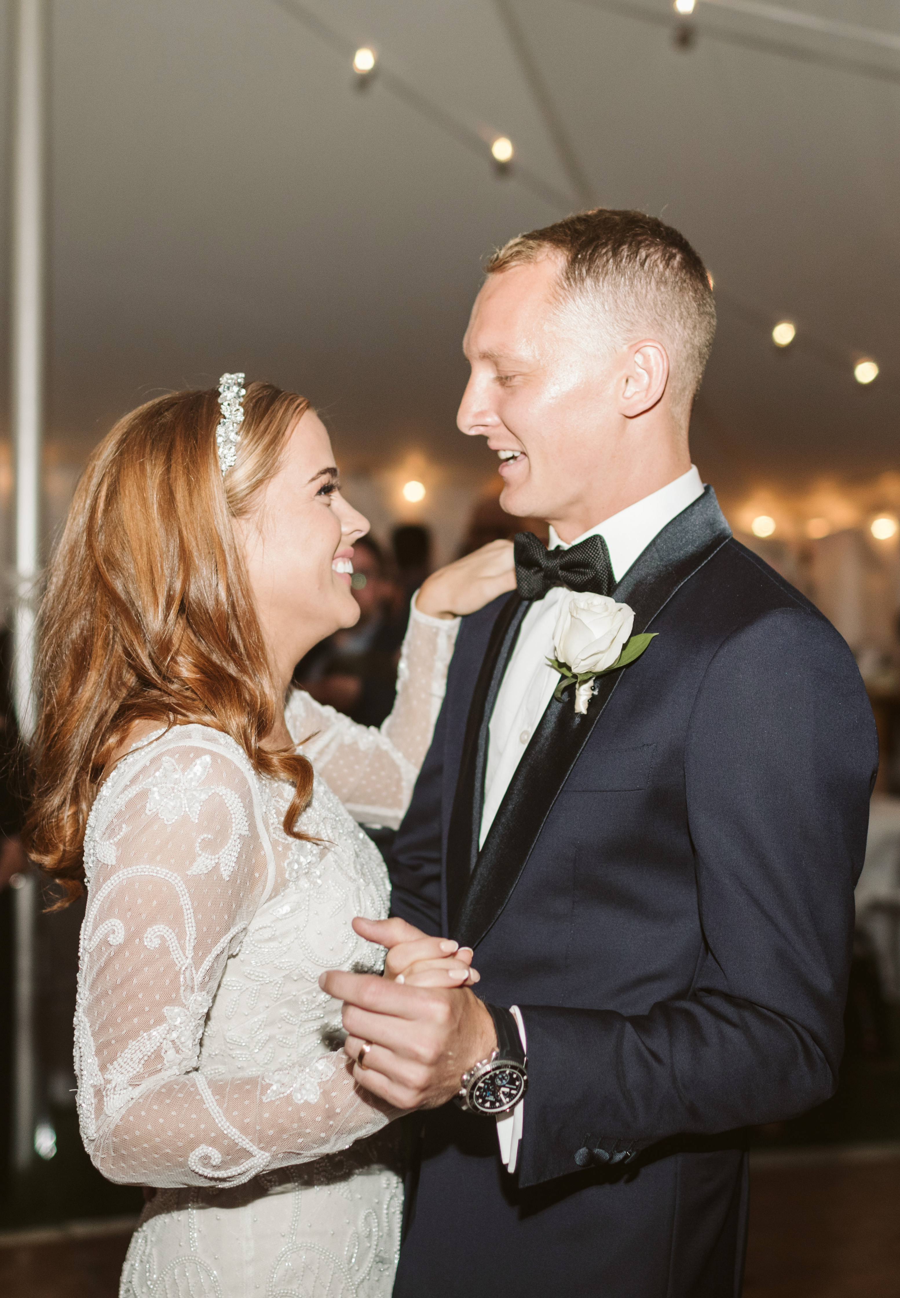 Bride and groom sharing a joyful dance during their Southern Ontario wedding reception.