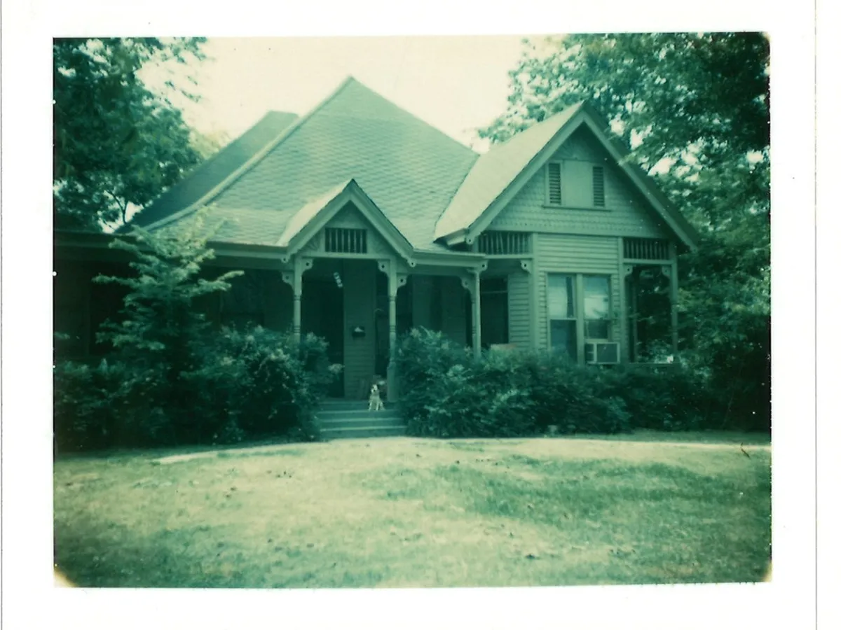 Vintage photo of the Victorian house from the front lawn