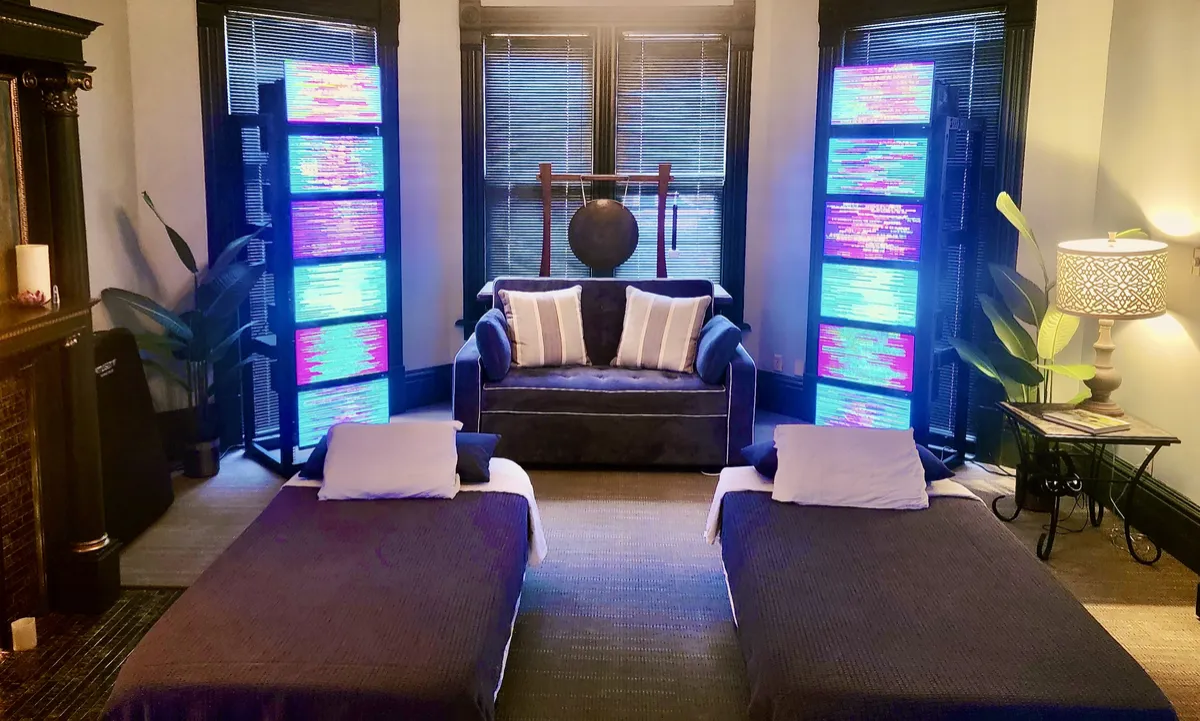 EESystem overnight room with two beds between light-panel towers