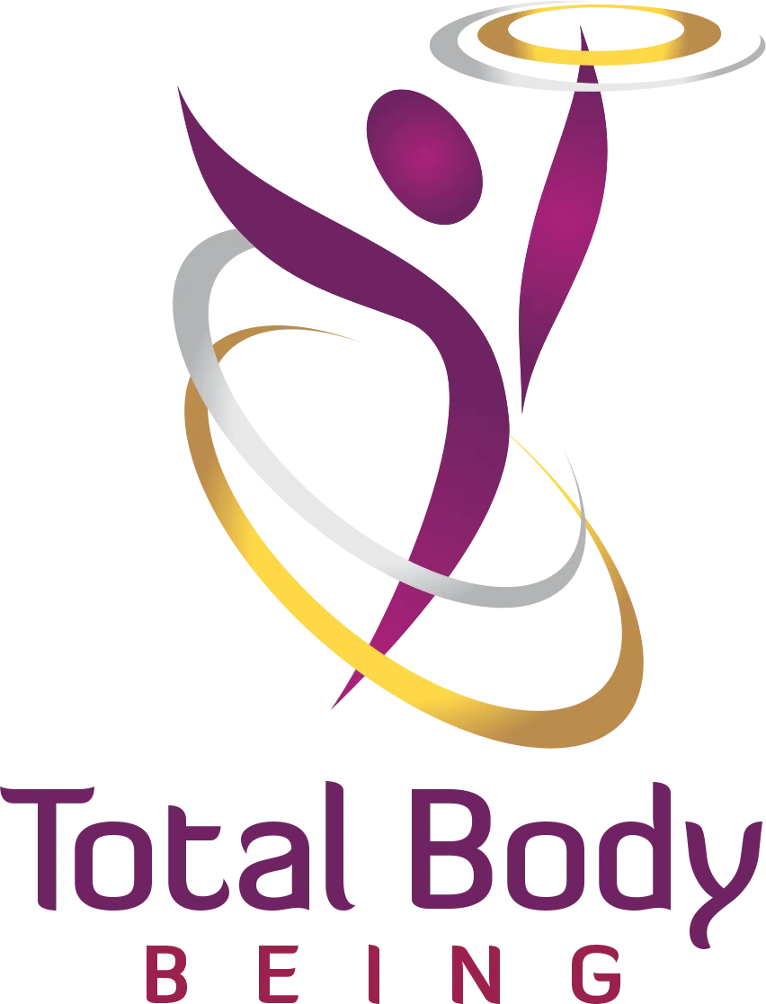 Total Body Being treatment room with bodywork table and fireplace