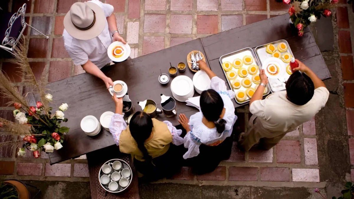 people serving food on a buffet to illustrate our hospitality industry pest control services at network pest control 