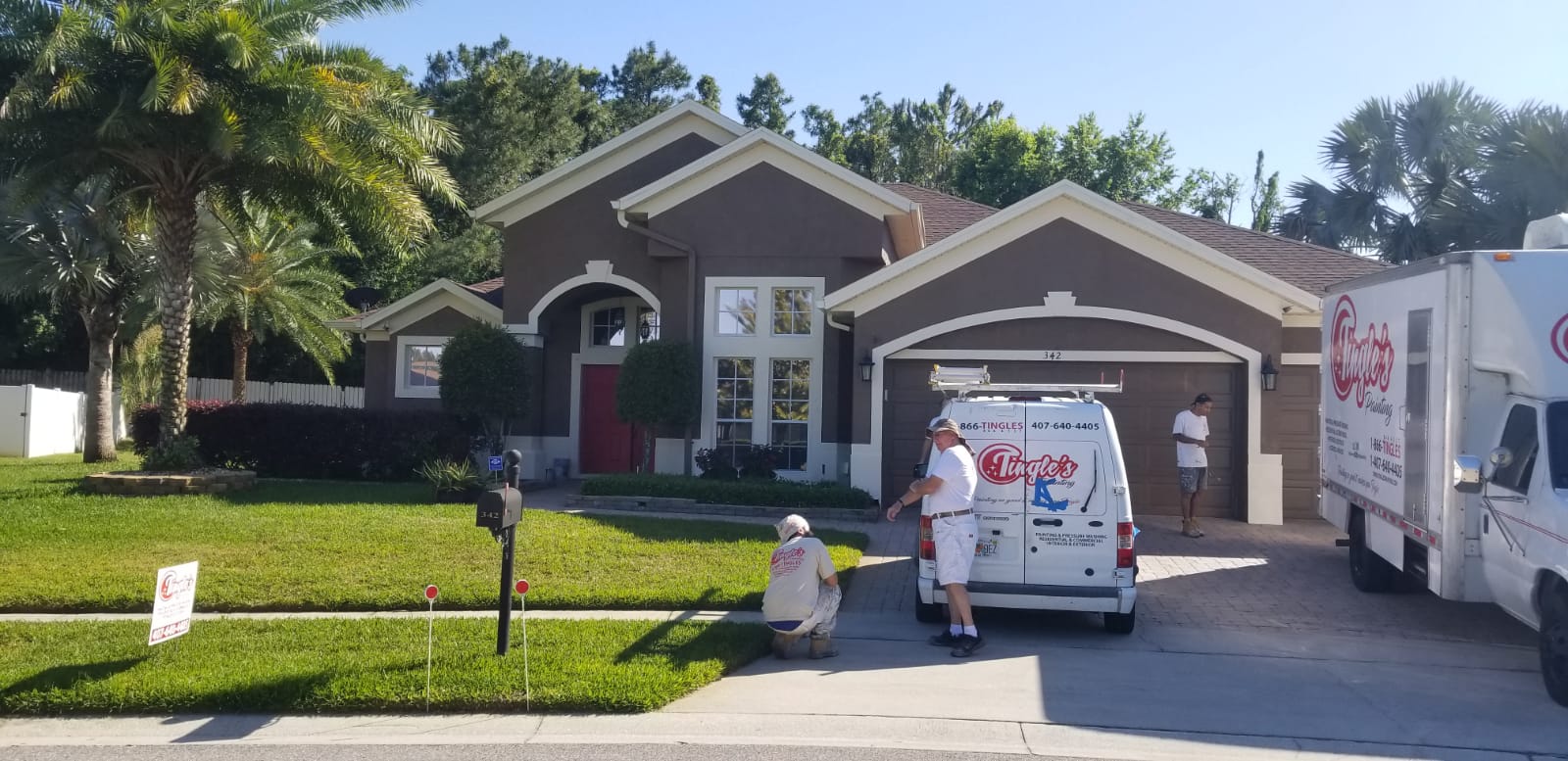 Before-and-after exterior of a two-story craftsman home in Orlando with revitalized paint and crisp trim lines.