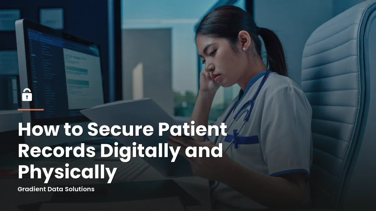 Practice administrator reviewing secure patient records at a medical office workstation