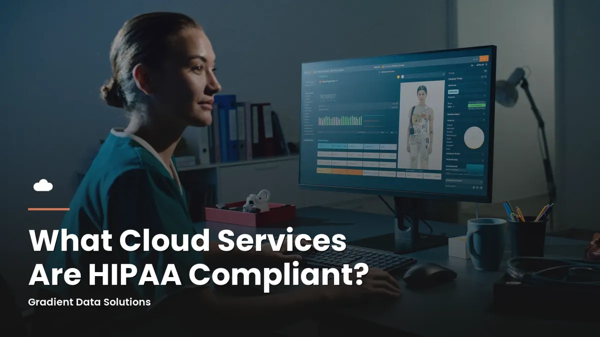 Practice administrator reviewing HIPAA-compliant cloud software at a medical office workstation