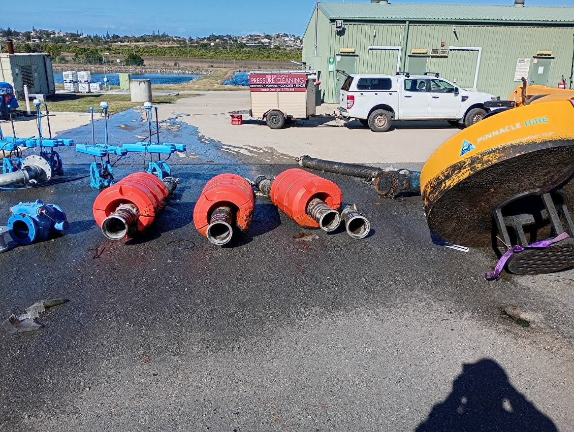 pipes and orange requipment on floot