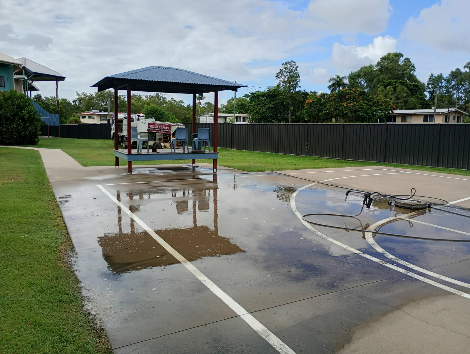 wet basketball court with water on it