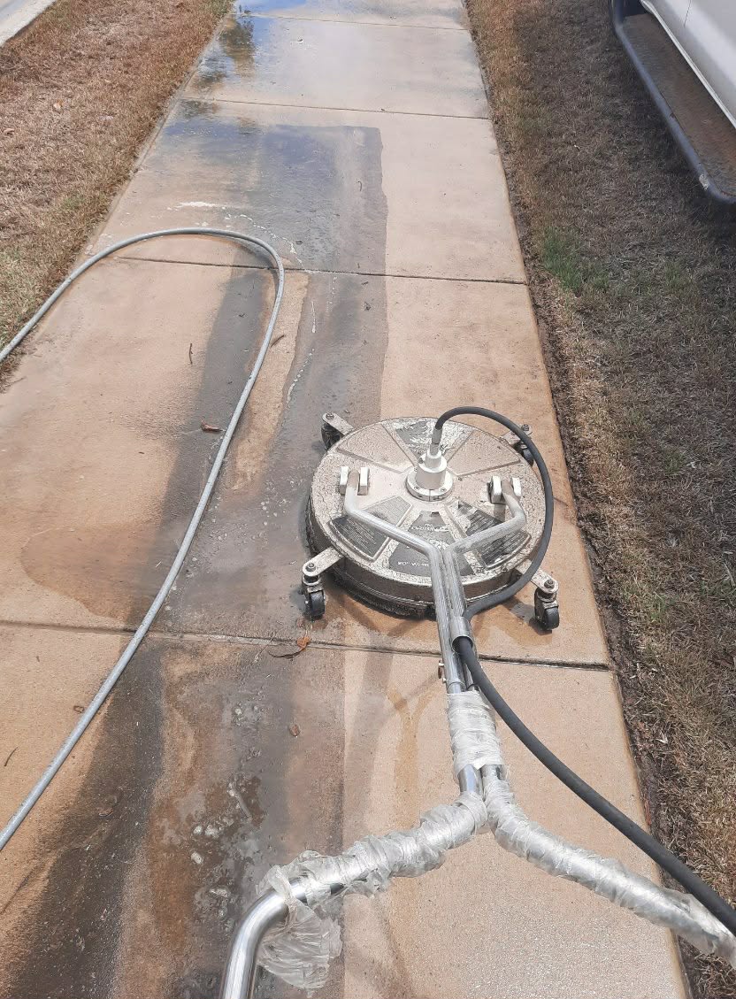pressure cleaner on concrete path