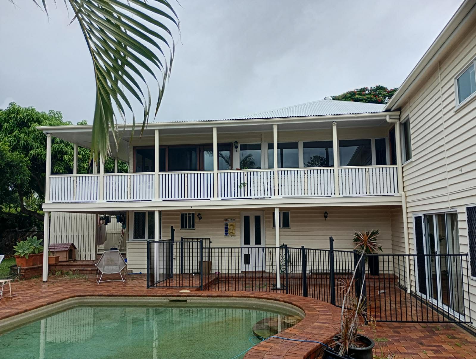 gladstone multi storey house with pool outside