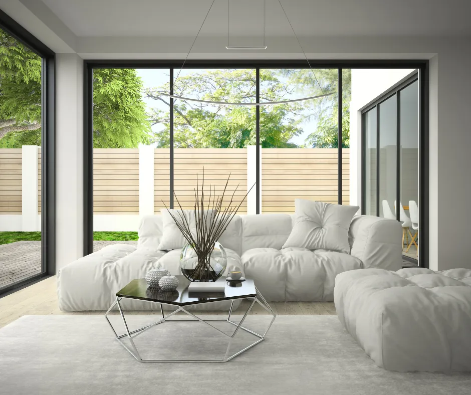 Image of Window Cleaning for One Stop Cleaning Services Person Wiping Window with Cleaner