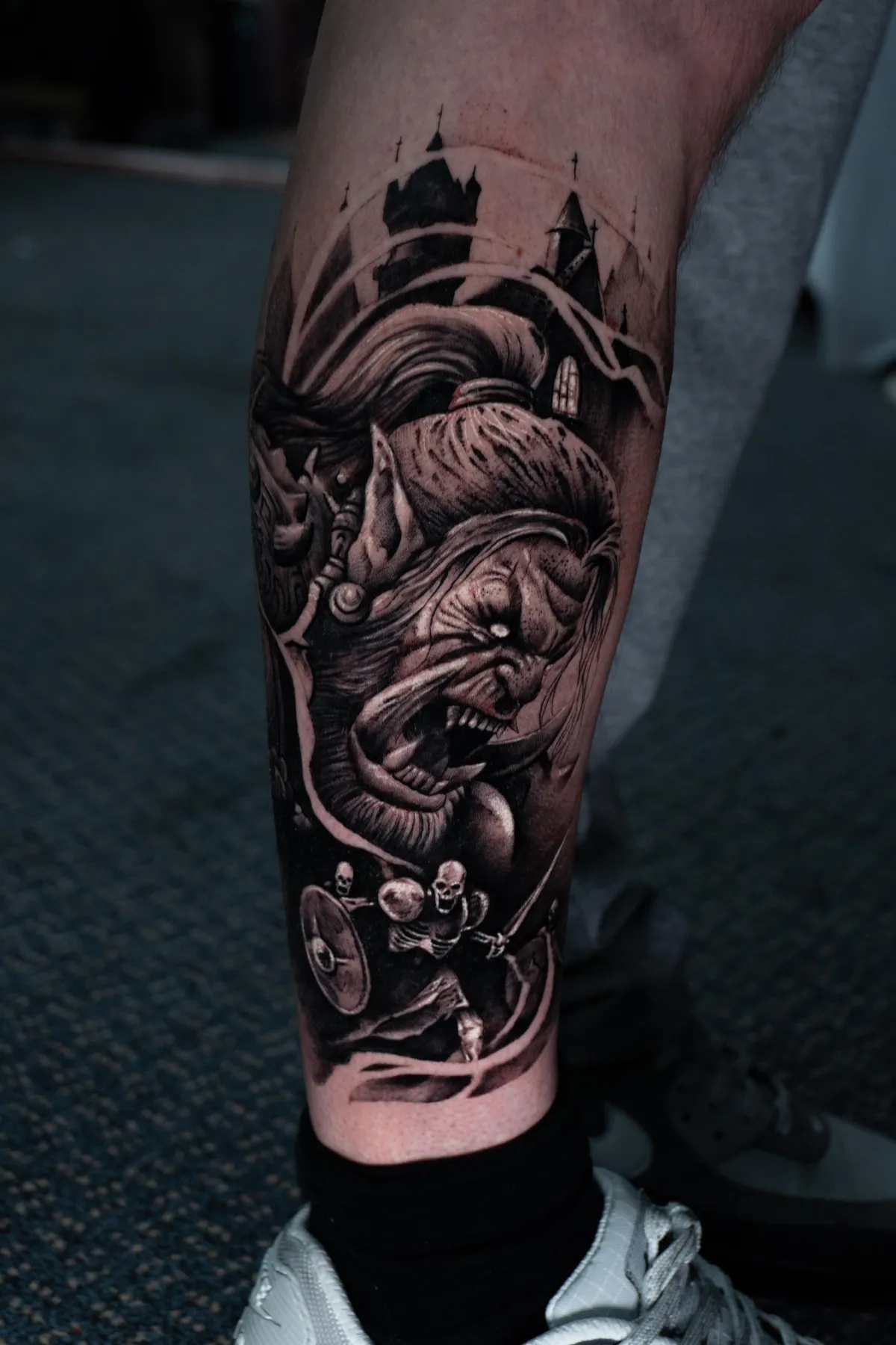 person with tattoo on right arm