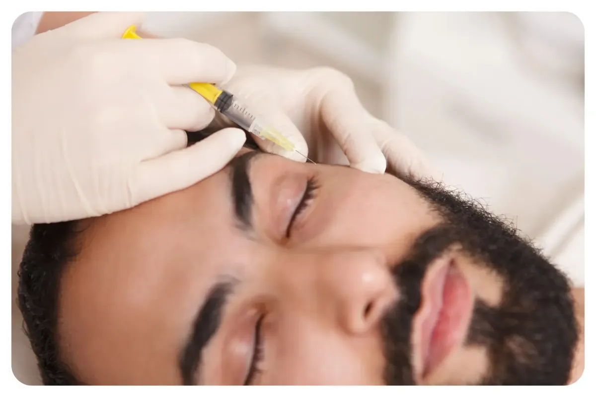 Nurse performing anti-wrinkle Botox treatment with collagen and PRP hair restoration products in a modern clinic setting
