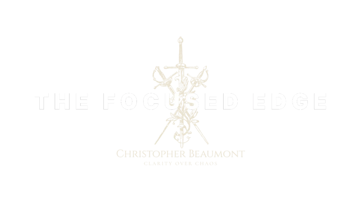 The Focused Edge logo in white and gold with transparent background, used for brand identity and header display