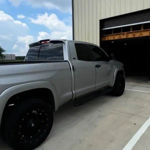 Chevrolet Tahoe rear window tint in Richmond TX with dark tint finish