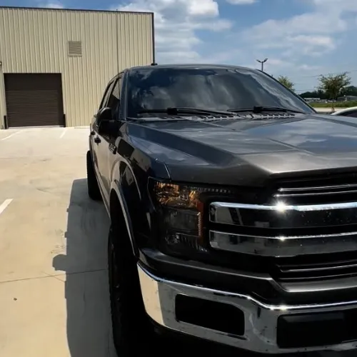 Professional car tint installation in Stafford TX with smooth and bubble free finish