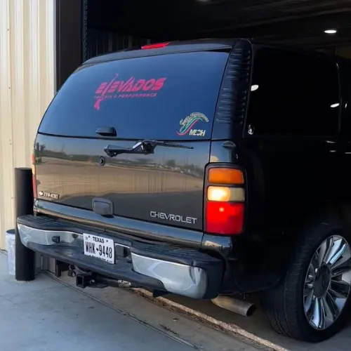 Chevrolet Tahoe rear window tint in Richmond TX with dark tint finish