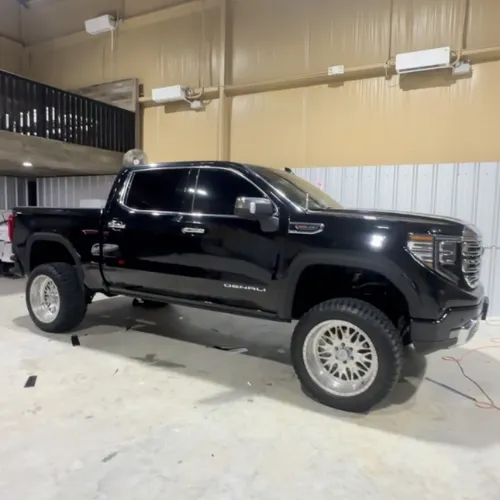 Black lifted truck window tint in Houston TX with full tint package