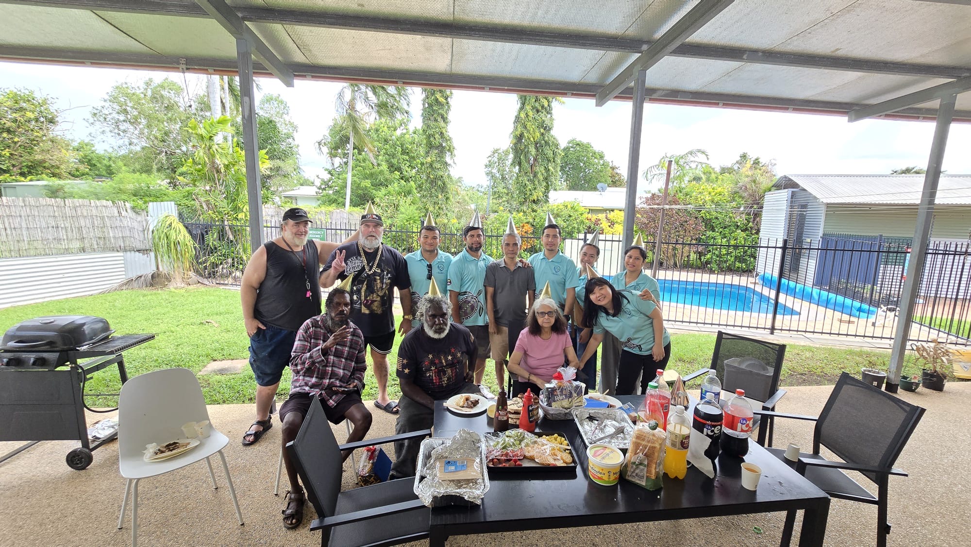 ACRS Community Services team members and participants gathered together at their Wanguri home in Darwin