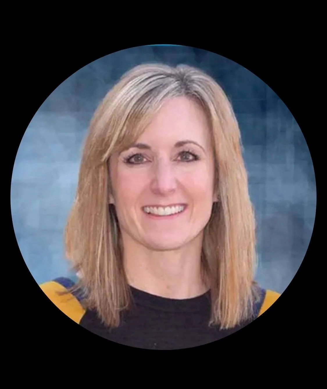 Gina Smith, PA-C, smiling in professional attire, showcasing expertise in patient care at Apex Wound Management.