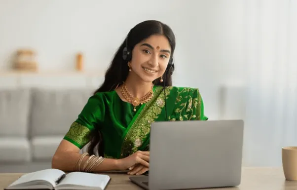 person writing on white paper