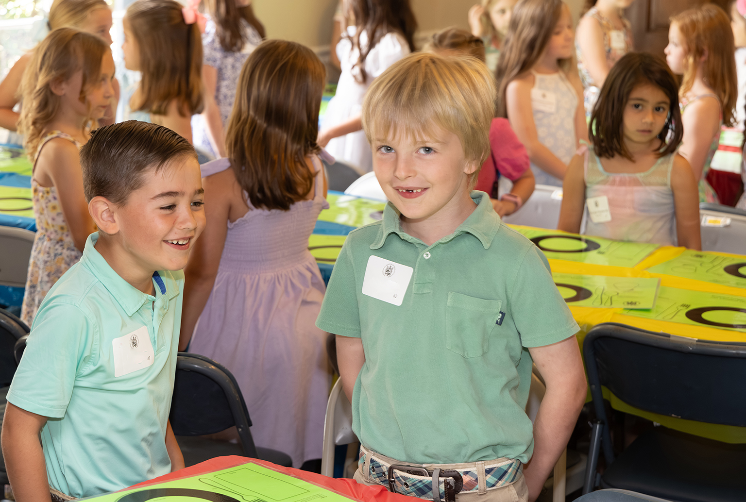 Young gentlemen and ladies learning table manners and introducing themselves at NLJC Pre-Cotillion CLass in Brentwood, TN 