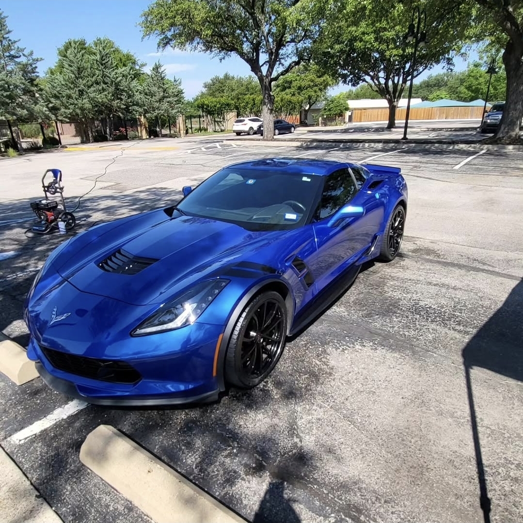 Auto detailing in Farmers Branch TX - LG Mobile Detailing servicing a blue Corvette in a parking lot