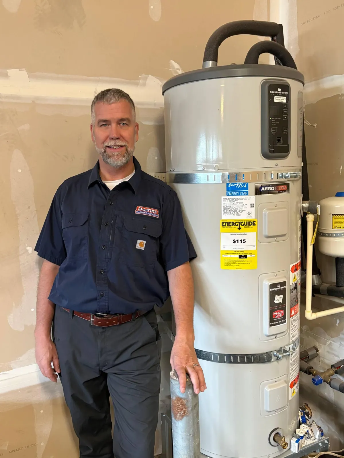 Crew in front of plumbing van