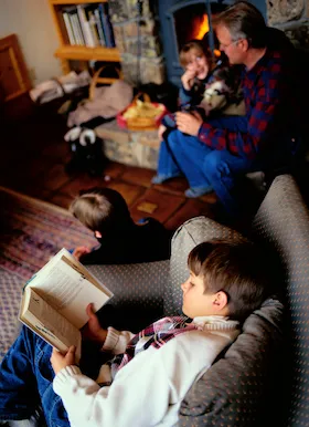 family enjoying time in the living room with cozy heat