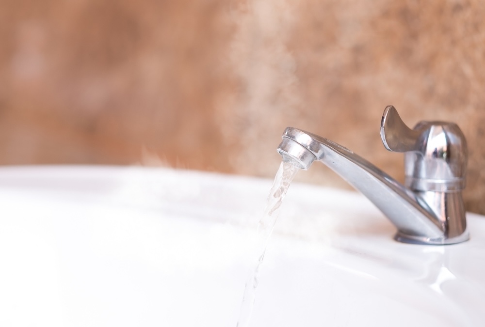 running steamy hot water faucet