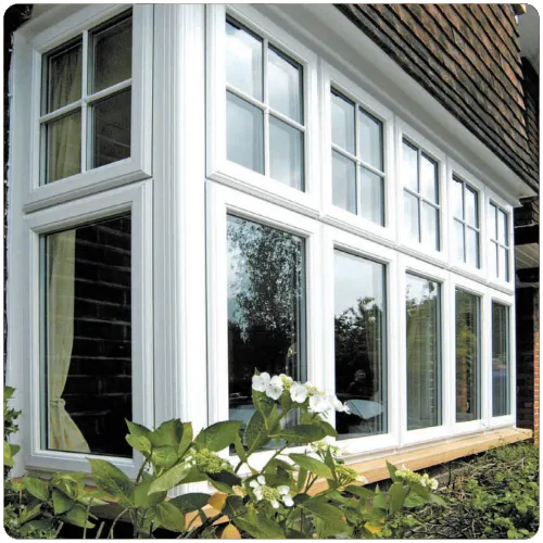 White uPVC casement windows installed on a traditional Yorkshire property with Georgian style glazing bars