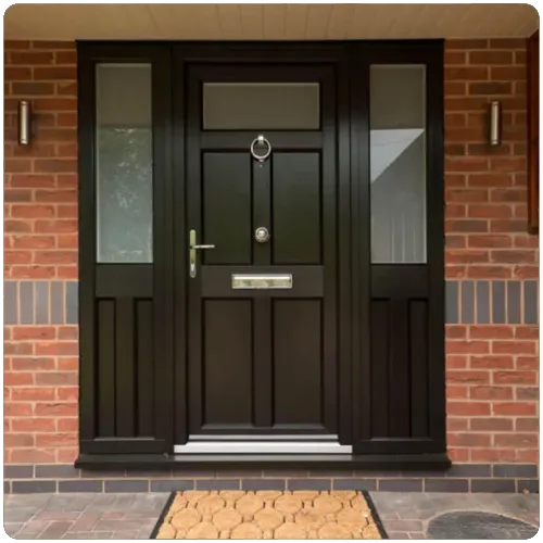 Black heritage composite front door with glazed sidelights installed on a traditional brick property in Yorkshire