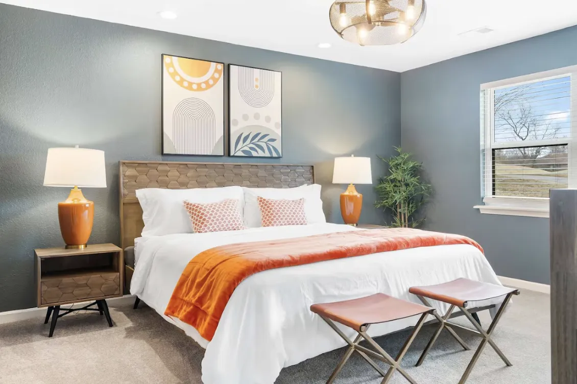 Handcrafted retreat cabin nestled among firs in late-afternoon light.