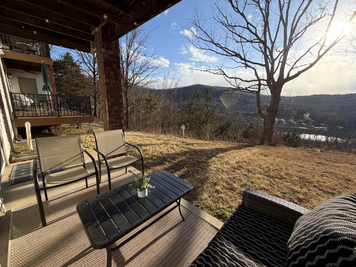 Handcrafted retreat cabin nestled among firs in late-afternoon light.