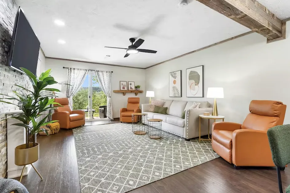 Wooden walkway leading into a cedar grove with dappled sunlight