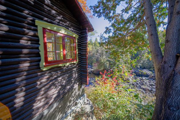 A stream running through a snow covered forest