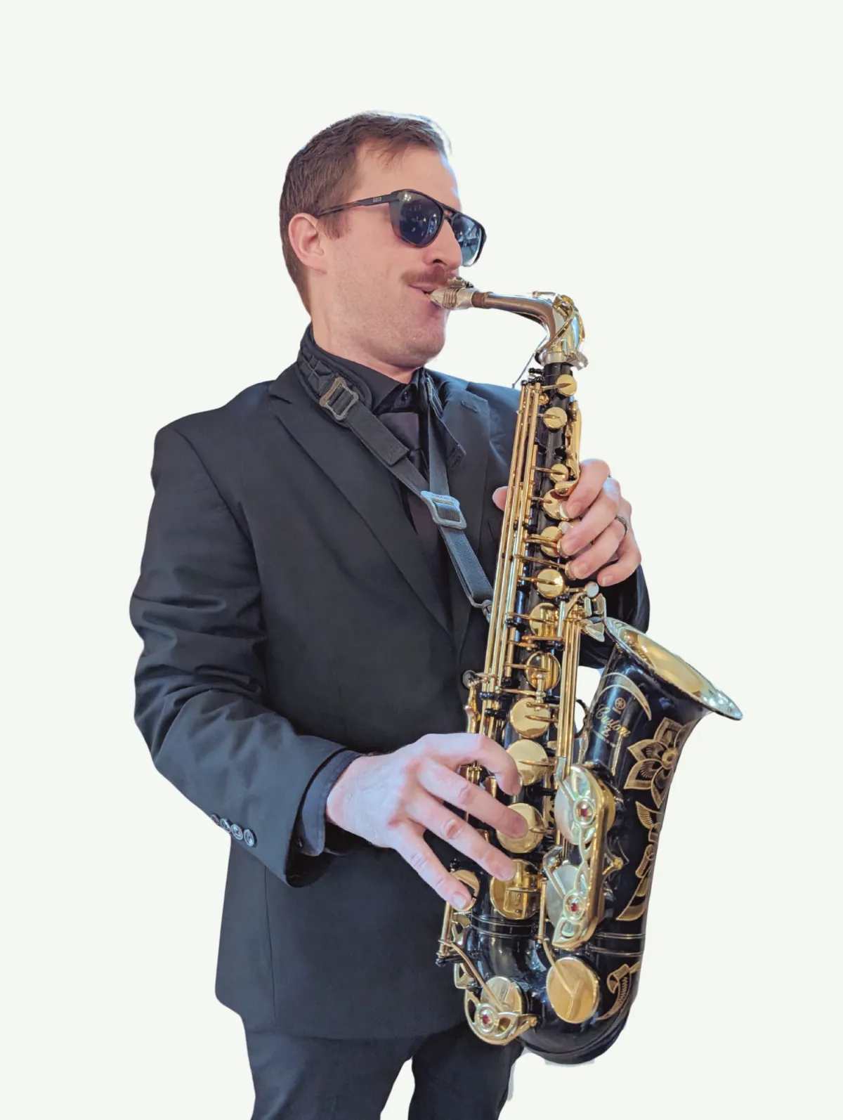 Saxophonist wearing sunglasses and playing saxophone