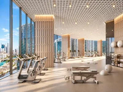 Render del gimnasio de lujo en One Twenty Brickell Signature Residences, Miami, equipado con máquinas de cardio, área de entrenamiento y ventanales panorámicos con vistas a Brickell.