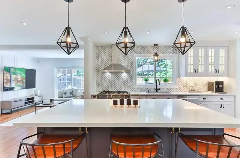 Recently remodeled kitchen in Jacksonville, featuring modern cabinetry, stainless steel appliances, and polished granite countertops.